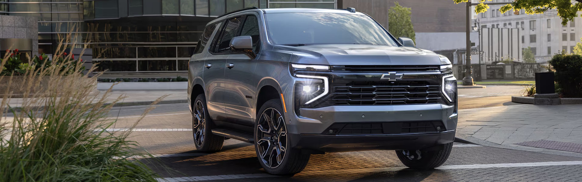 2025 Chevrolet Tahoe is parked front of building
